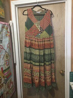 Raindrops multi colored maxi dress measures 19 pit to pit and waist is 18 inches